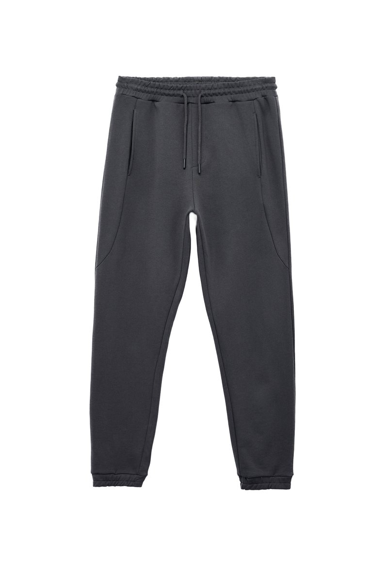 Donkergrijze joggingbroek met een elastische tailleband, koordje, twee zijzakken en geribbelde boorden bij de enkels. Gladde textuur, casual ontwerp.