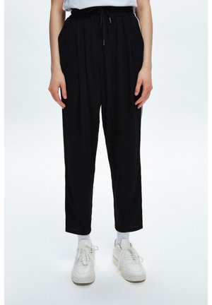 Träningsbyxor - black