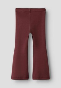Pantalon évasé couleur bordeaux pour enfant avec taille élastique, présenté à plat sur un fond gris clair.