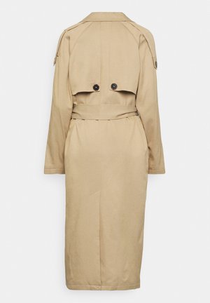 Beige trench coat with a belted waist, shoulder epaulettes, double buttons on the back, and a lined interior. Full-length sleeves and back vent.