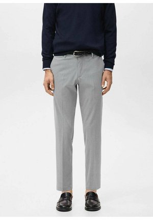 Gray tailored trousers with a straight fit, featuring a flat front, belt loops, and a smooth texture, paired with black slip-on shoes.