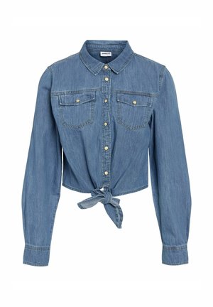 Blue denim crop shirt with long sleeves, button front, two chest pockets, and a knotted tie detail at the hem. Classic collar design.