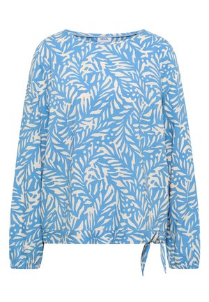 Blouse bleu à manches longues avec motif abstrait de feuille blanche et poignets élastiques, dotée d'un petit détail noué à l'ourlet.