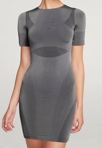 Gray fitted dress featuring short sleeves, a textured surface with geometric patterns, and a body-hugging silhouette.