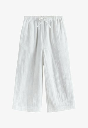 Fehér, széles szárú nadrág rugalmas derékpánttal és elöl húzózsinórral, könnyű, texturált anyagból készült.