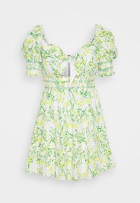 Abito floreale bianco con motivi botanici gialli e verdi, maniche corte a palloncino e corpino aderente. Vita arricciata con gonna a campana.