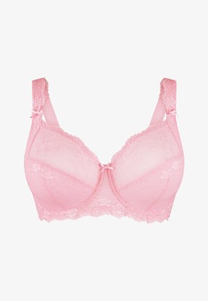 Lichtroze beha van kant en mesh. Heeft gestructureerde bloemenpatronen, verstelbare bandjes en decoratieve strikjes op de bandjes.