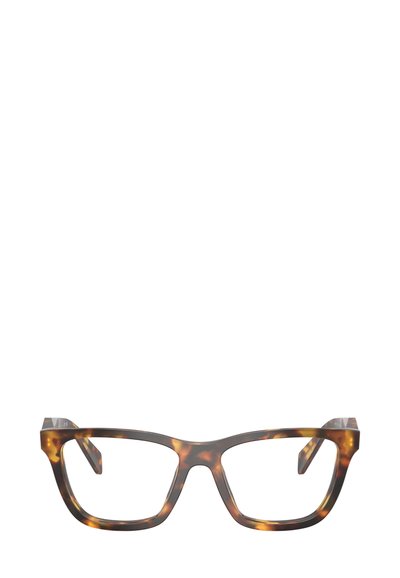 Occhiali con montatura spessa in plastica con motivo tartarugato, lenti rettangolari e design angolare distintivo con sottili dettagli metallici.