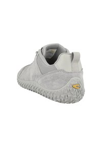 Gray athletic shoe with a suede and mesh upper, textured rubber sole, and a pull tab at the back. Features a small yellow logo detail.