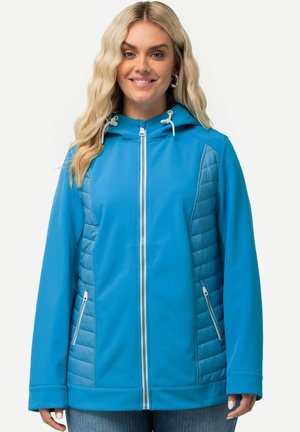 Blauwe hoodie-jack met een geborduurd ontwerp aan de zijkanten, ritssluiting en twee voorzakken. Het heeft een gladde textuur en contrasterende accenten.