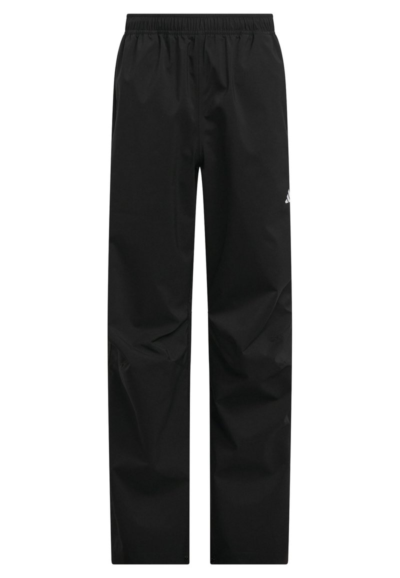 Pantalons de survêtement noirs en tissu léger, dotés d'une taille élastique et d'un logo discret près de la poche gauche. Texture lisse sur l'ensemble.