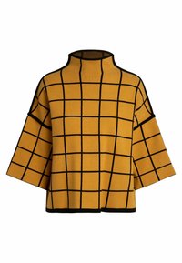 Żółty dziany pulower z wysokim kołnierzem, z czarnym wzorem w kratę, szerokimi rękawami i czarnym obszyciem wokół dekoltu i dołu.