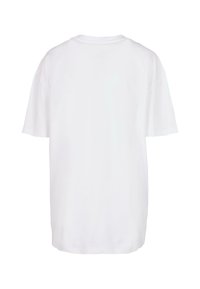White cotton t-shirt with short sleeves, a relaxed fit, and a round neckline. The back is plain with no text or graphics.