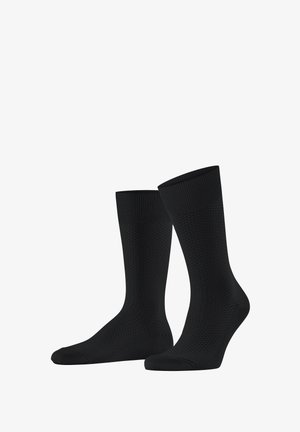 Paquet de deux chaussettes noires mi-mollet avec une texture et des bords côtelés, présentées côte à côte sur un fond blanc.