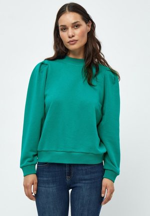 Grön sweatshirt med rund halsringning, puffärmar, ribbade manschetter och nederkant. Mjuk tyg, avslappnad passform och minimalistisk design.