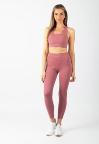 Carlheim Leggings - Byxor - berry