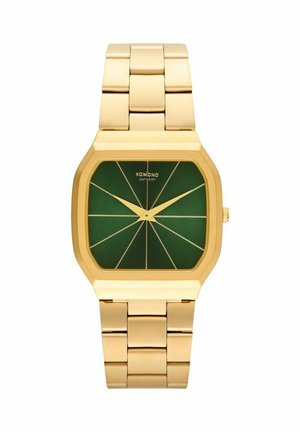 Montre en métal doré avec un boîtier octagonal et un cadran vert. Présente des index et aiguilles dorés avec un motif géométrique sur le visage.