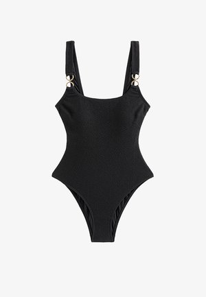 Schwarzer, strukturierter Badeanzug mit breiten Schulterträgern und goldenen Ringakzenten an den Trägerbefestigungen.