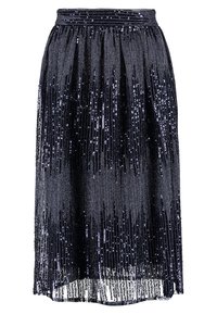 Jupe en sequins marine avec un design plissé, dotée d'une taille lisse et de décorations texturées verticales scintillantes sur toute sa surface.