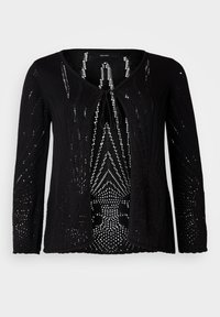 Mustan neulotun cardiganin avointa etua, jossa on monimutkaisia leikkauksia ja solmimisellä oleva kiinnitys. Pitkät hihat ja aaltoileva helma.