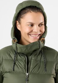 Olive green puffy jacket with a zipped front, high collar, and adjustable hood. Features drawstrings with black accents and a smooth texture.