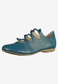 Teal leren platte schoenen met een ronde neus, voorzien van een uitgesneden ontwerp en kruislings veters op de bovenkant. Zachte textuurzool.
