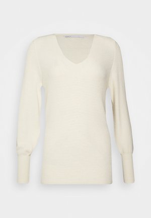 Sweter w kolorze kremowym z dzianiny, z dekoltem w kształcie litery V, długimi rękawami i teksturowanym materiałem z prążkowanymi detalami. Prosty i minimalistyczny design.