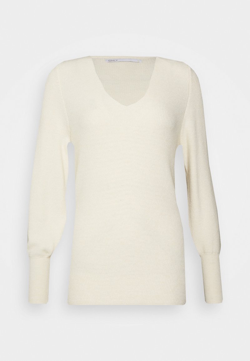 Krämfärgad stickad tröja med V-ringning, långa ärmar och textil med ribbade detaljer. Enkel och minimalistisk design.