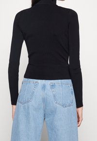 Gina Tricot Stickad tröja - black