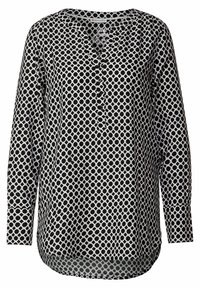 Černobílá košile s dlouhým rukávem, kulatým výstřihem a knoflíkovou légou, zdobená geometrickým kruhovým vzorem po celém povrchu. Měkká tkanina.