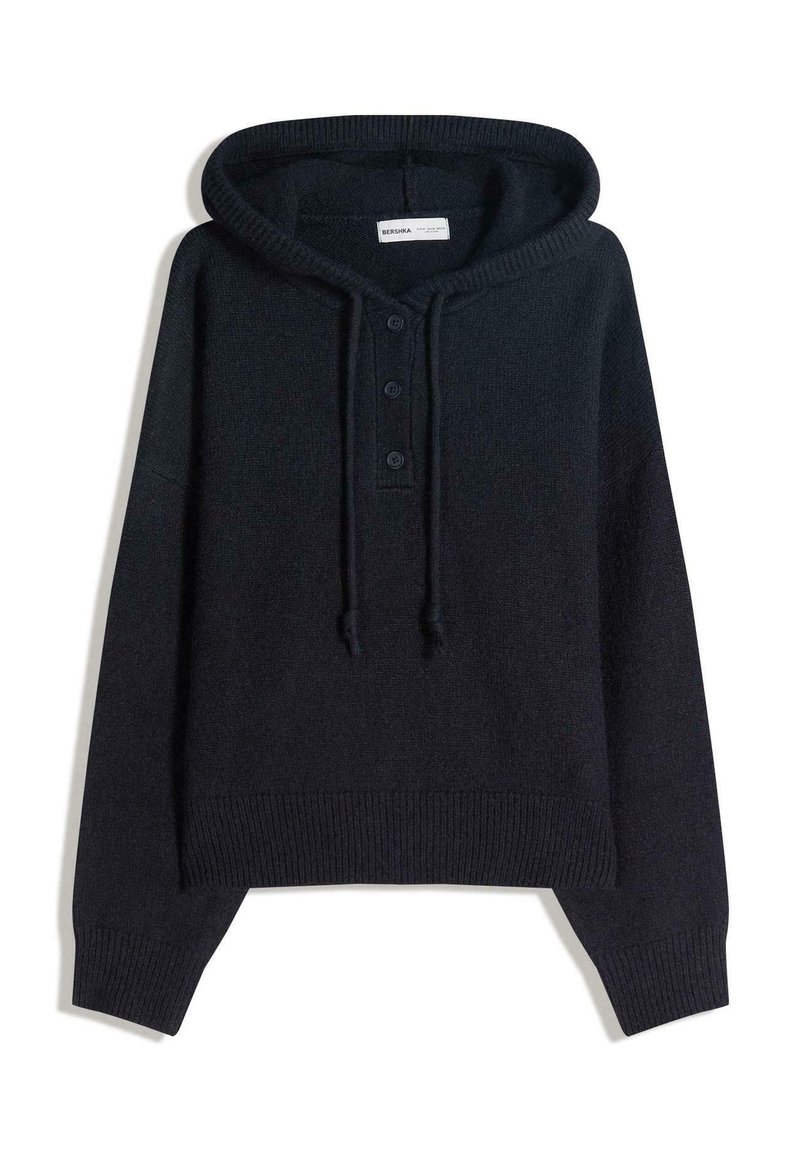 Hanorac bleumarin închis cu glugă și tricotaj texturat, prevăzut cu o pată cu nasturi și șnururi reglabile la glugă. Design cropped, manșete drepte.