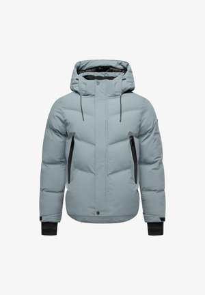 Gaiši zils pūkains apvalks ar kapuci, ar rāvējslēdzēju, melnajām rāvējslēdzēju kabatām un elastīgām aprocēm siltumam un komfortam.