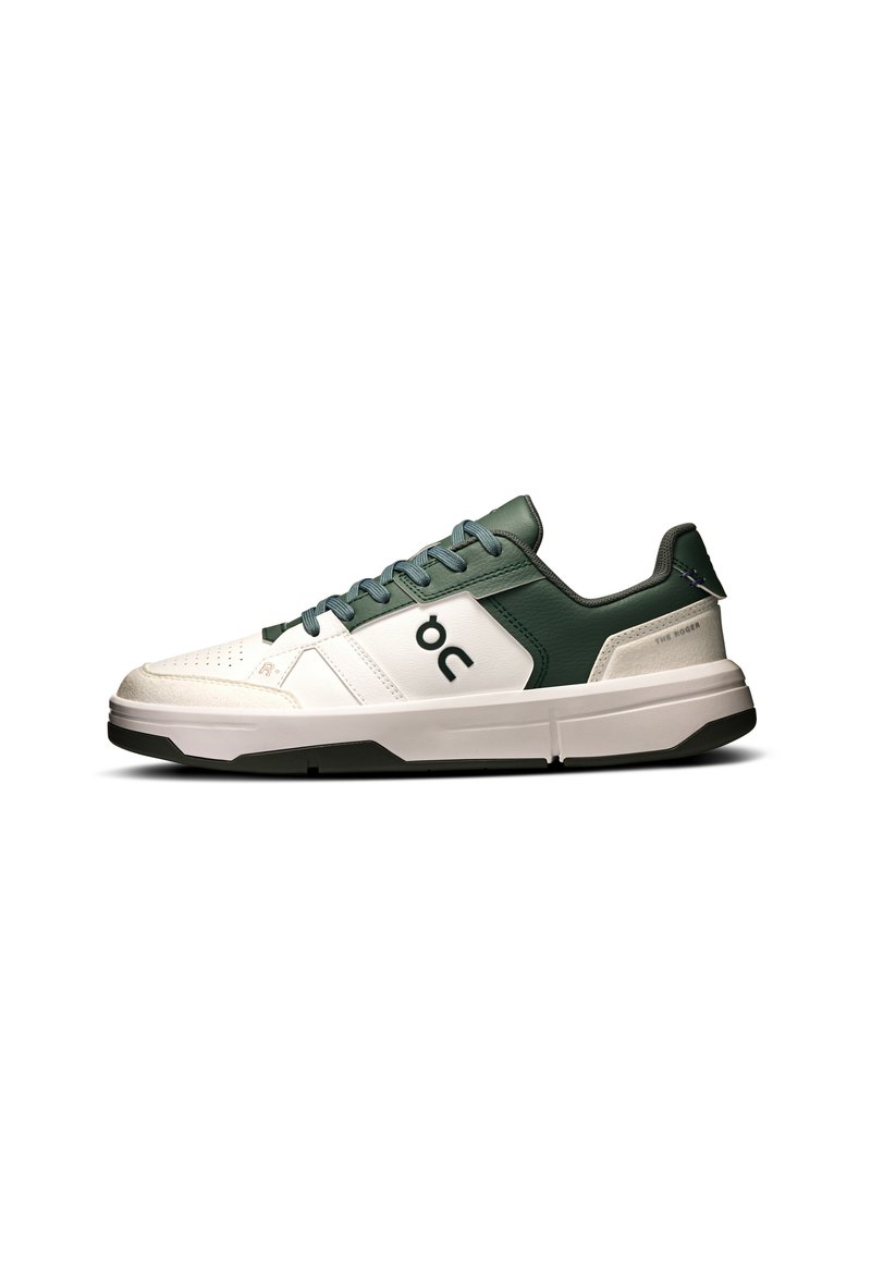 Men's sneakers with a white and dark green design. Features smooth leather, mesh accents, and a white rubber sole with black trim.