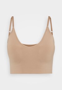 Béžový elastický bralet s tenkými nastaviteľnými ramienkami, výstrihom do tvaru lode a bezšvovým dizajnom. Mäkko hladký materiál s minimálnymi detailmi.