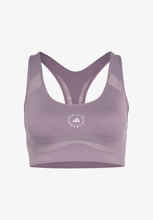 Sportovní podprsenka v tlumené levandulové barvě s hladkou texturou. Ramínka se zkřížením na zádech a síťované panely zvyšují prodyšnost. Obsahuje detail s kruhovým logem.