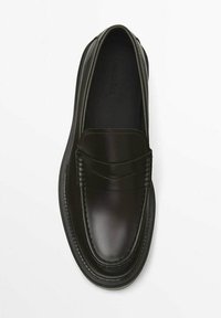 Black leather loafer with smooth surface, stitched detailing, and a raised accent on the vamp. Flat sole with subtle tread pattern.