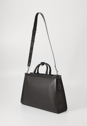 Rankning 12: Tiger of Sweden - ACORI UNISEX - Axelremsväska