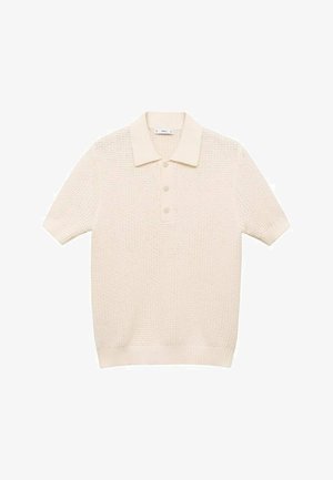 Koszulka polo z krótkim rękawem w kolorze kremowym, z teksturowanym wzorem, trzema guzikami i ściągaczami przy kołnierzyku oraz dolnym wykończeniu.