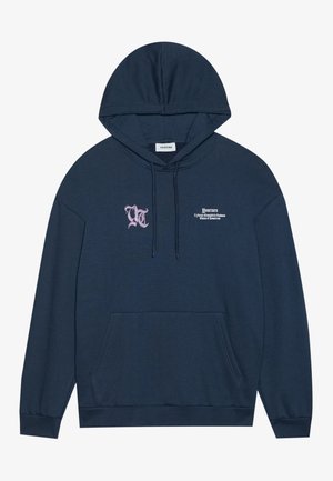 Navy blue pullover hoodie made of soft fabric, featuring a front kangaroo pocket and pink graphic text on the chest and sleeve.