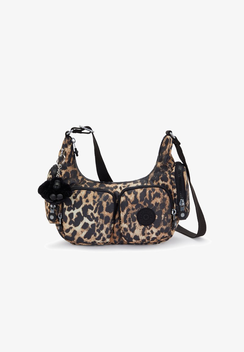 Leopard-print fabric shoulder bag with two front zip pockets, black accents, adjustable strap, and a small furry charm attached.
