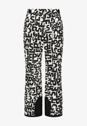 Schwarz-weiße gemusterte Hose mit großen Schriftzügen, geradem Schnitt und seitlichen Taschen sowie Kontrastpaneelen am unteren Ende.