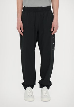 TROUSER - Pantalon de survêtement - black