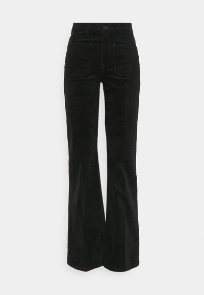 Black corduroy flared pants with a mid-rise waist, four pockets, and contrasting stitching. Smooth texture, wide leg design.