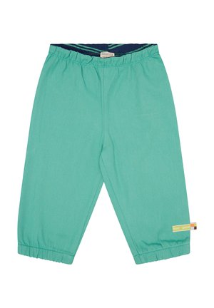 Pantaloni a cropped turchesi per bambini con vita elastica. Presentano polsini arricciati e una piccola etichetta laterale con strisce multicolori.