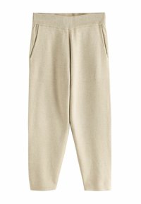 Helle beige Sweatpants mit elastischem Bund, zwei Seitentaschen und lockerer Passform, aus einem weichen, strukturierten Stoff.
