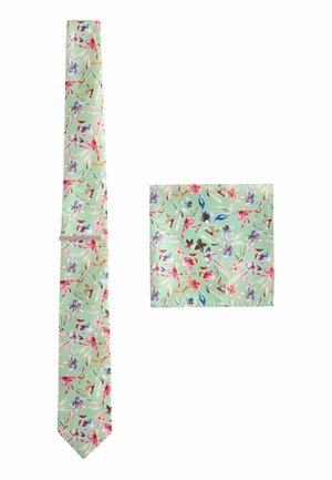 Hellgrünes Seideneinstecktuch und Krawattenset mit pinkem, lila und blauem Blumenmuster.