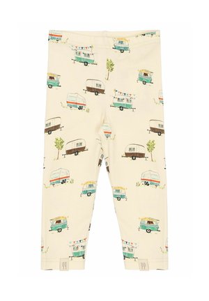 Legíny vyrobené z mäkkej tkaniny s svetlo béžovým pozadím a farebnými vzormi karavanov a stromov. Elastický pás, priliehavý strih.