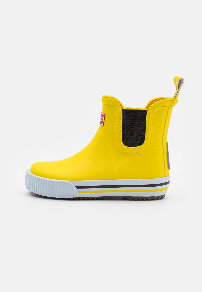 Yellow rubber ankle boot with elastic side panels, white and gray striped sole, and a pull tab at the back for easy wear.