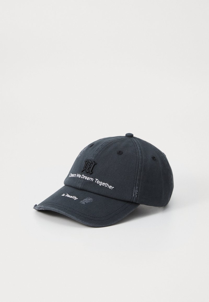 Dark blue baseball cap with stitched lettering. Features a curved brim, embroidered details, and slight wear marks.