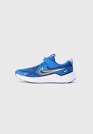 Blue athletic shoe featuring a mesh upper, black accents, a velcro strap, and a white sole with textured tread for grip.
